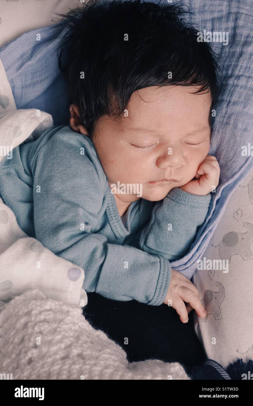 3 weeks Newborn baby taking a nap - Smartphone Captured Stock Image