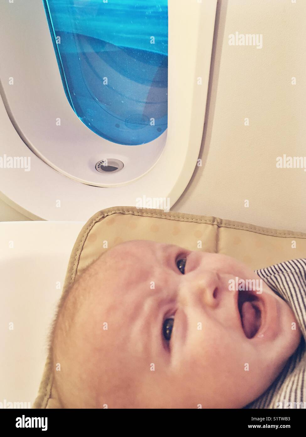 Newborn airplane hires stock photography and images Alamy