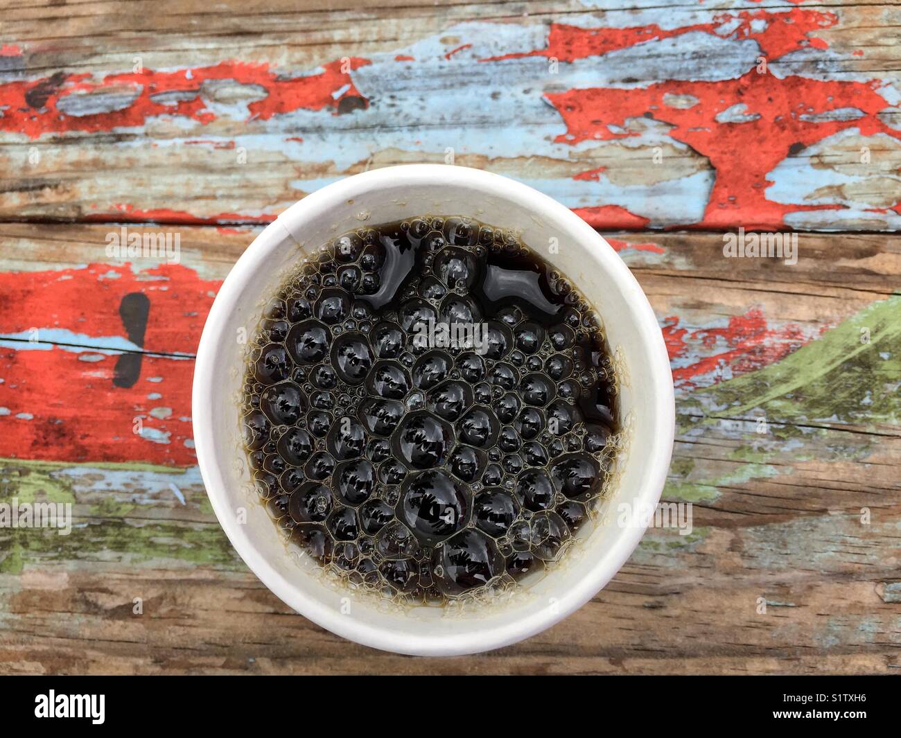 Bubbles in a cup of coffee Stock Photo Alamy