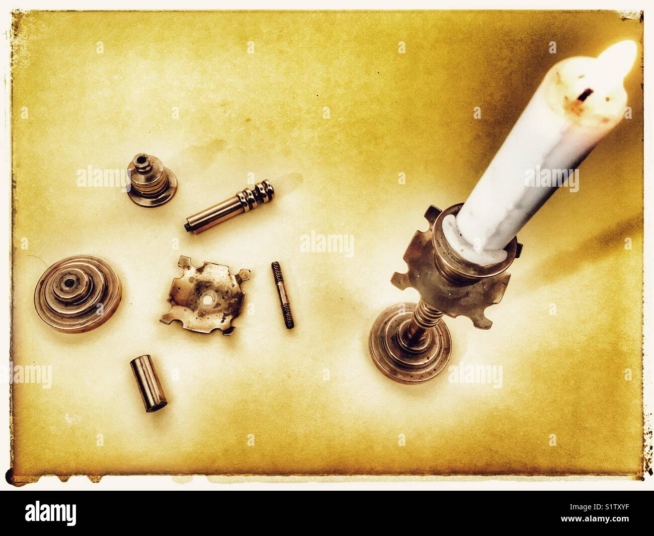 candle sticks handmade from shell cases onboard a warship during World War One. - Smartphone Captured Stock Image