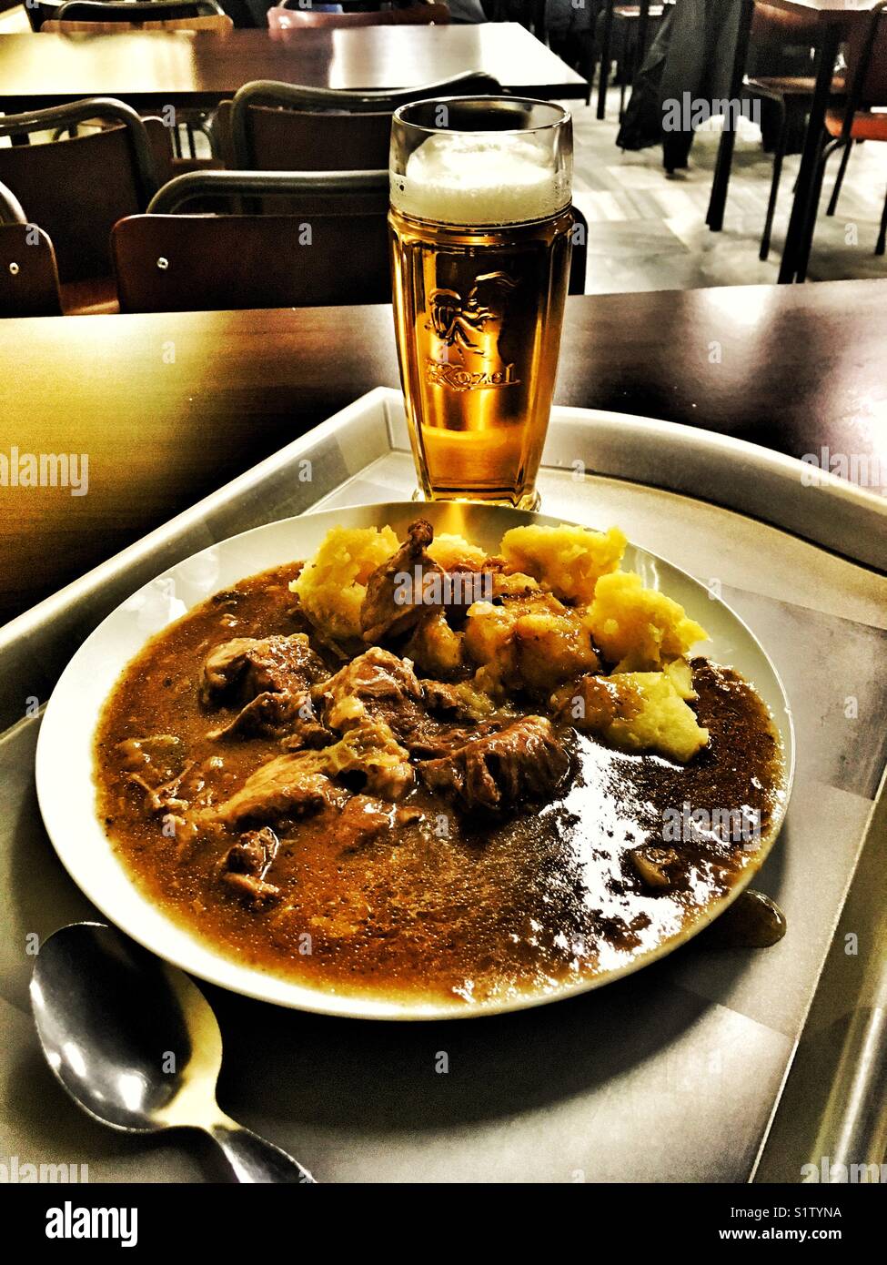Czech cheap folk canteen with cheap meals, goulash, potatoes and beer - Smartphone Captured Stock Image