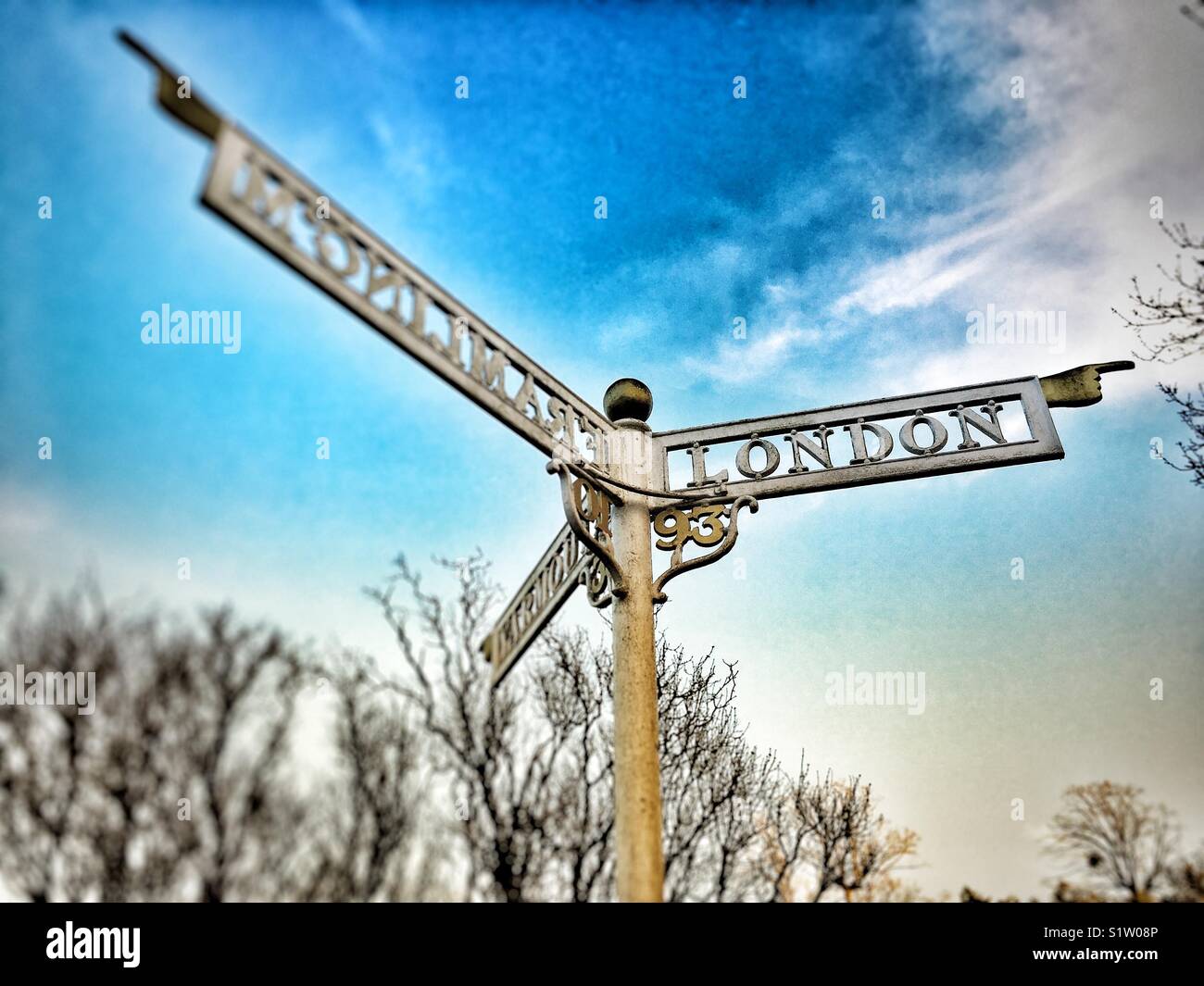 Old fashioned road sign UK - Smartphone Captured Stock Image