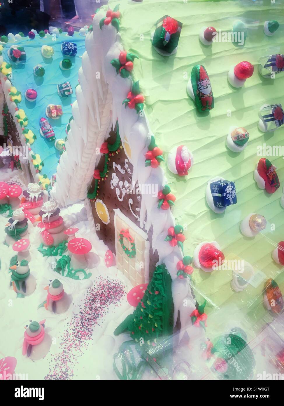 Gingerbread house with Christmas and winter time decorations. - Smartphone Captured Stock Image