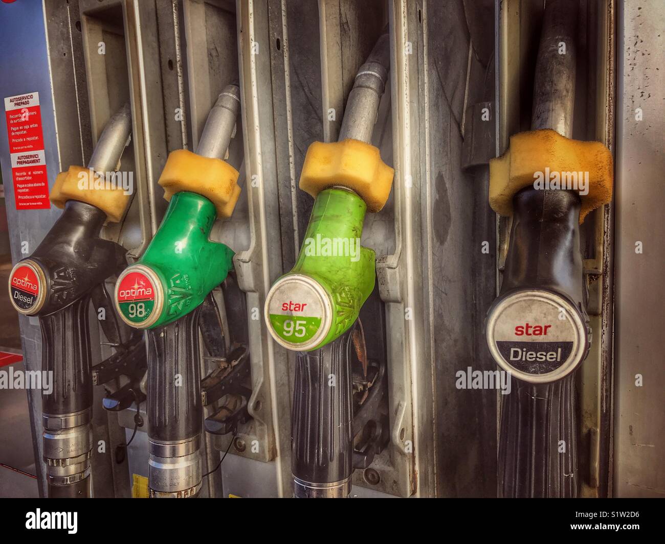 Fuel pumps at a filling station Stock Photo