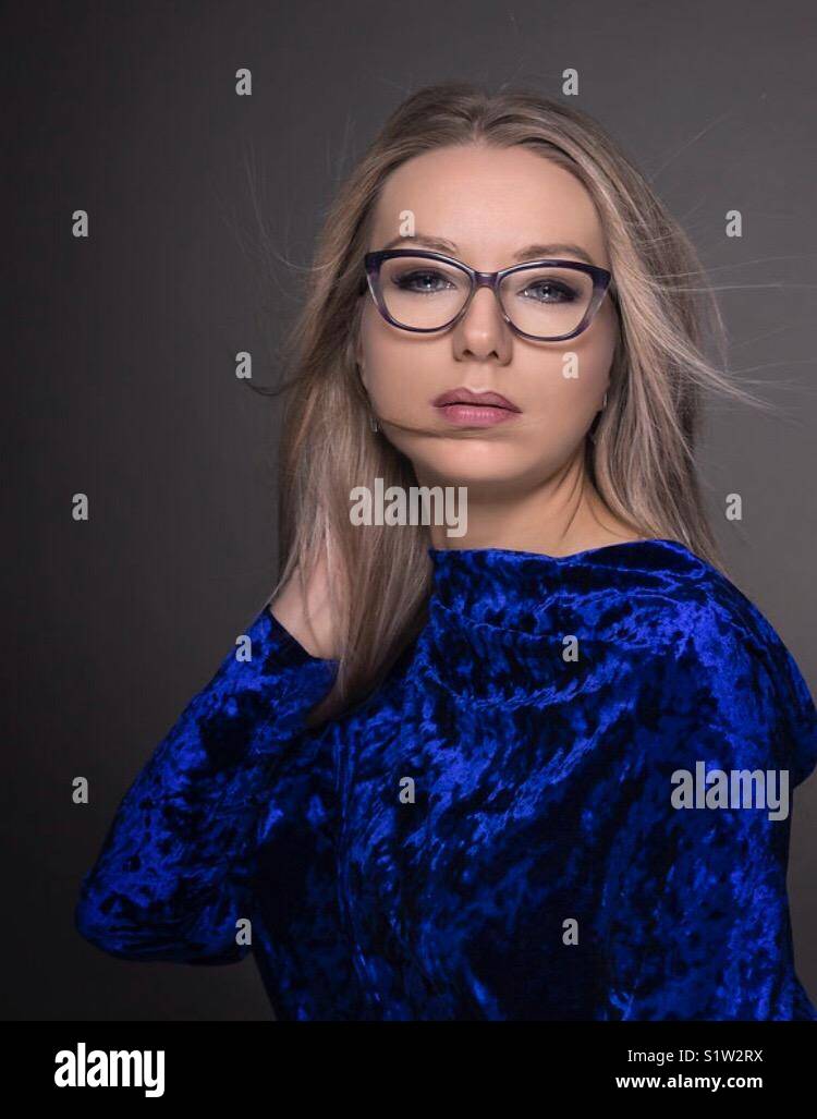 Blue eyes with glasses hi-res stock photography and images - Alamy
