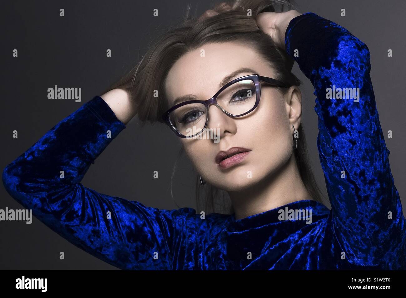 Blue eyes with glasses hi-res stock photography and images - Alamy