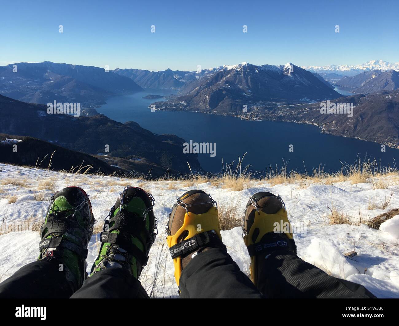 Savouring the beauty of Lake Como and Lake Lugano after a long hike Stock Photo