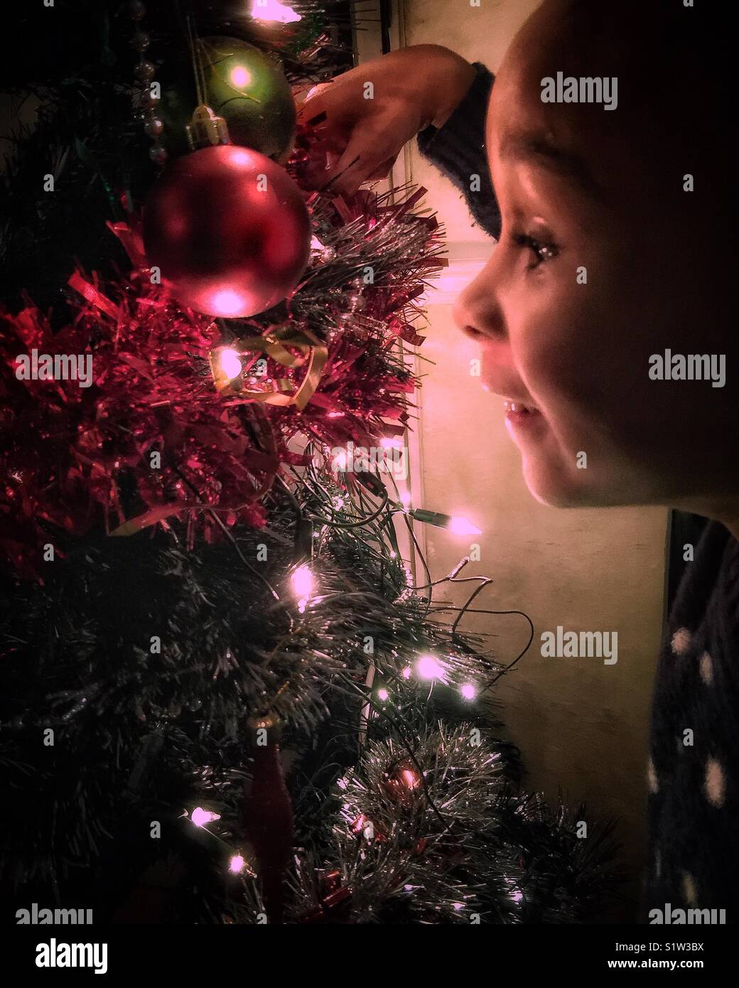 An excited child at Christmas. - Smartphone Captured Stock Image