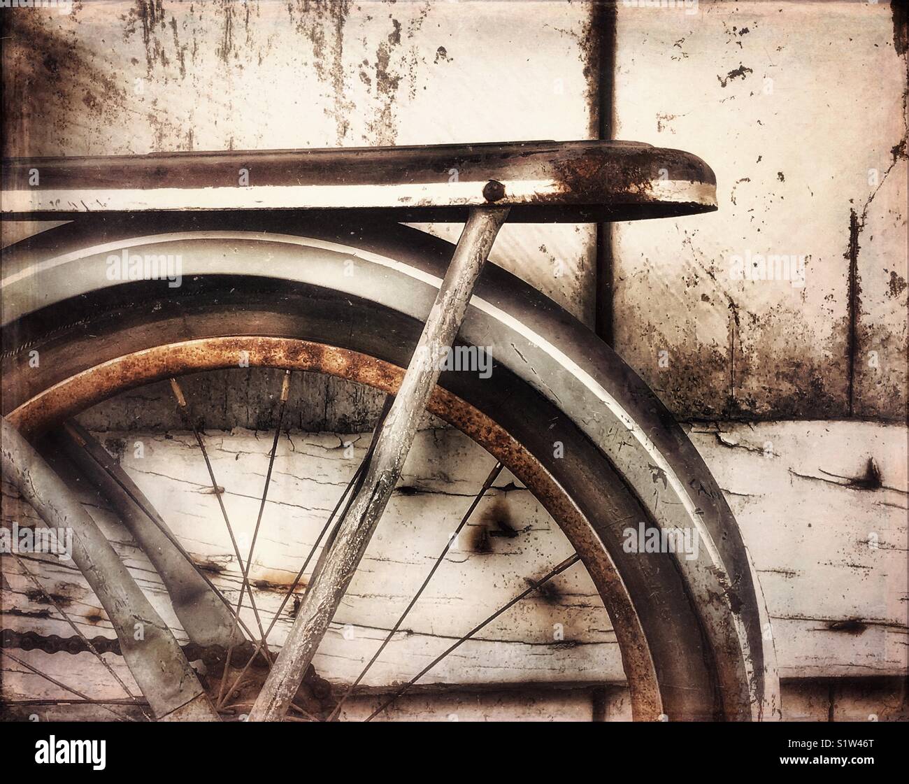 Old rusted bicycle in front of barn door - Smartphone Captured Stock Image Old rusted bicycle in front of barn door - Smartphone Captured Stock Image