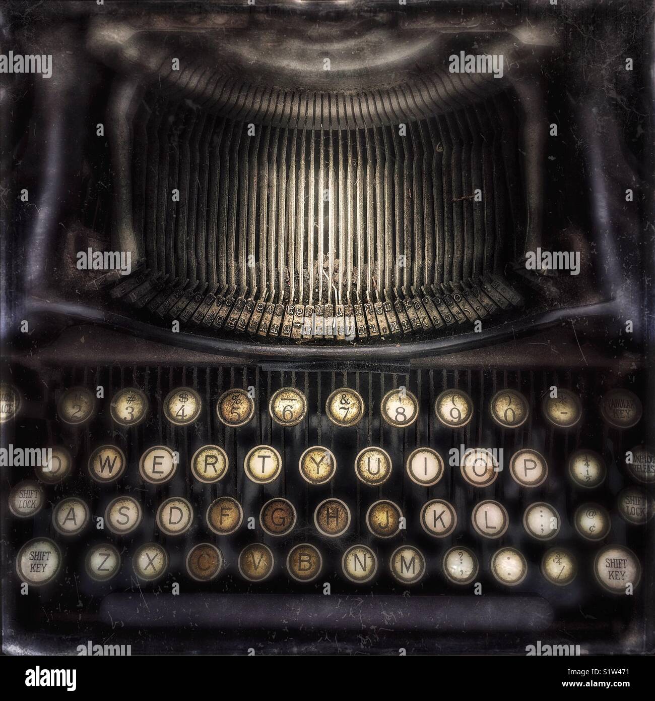 Writer typing with retro writing machine. Stock Photo by ©kkolosov