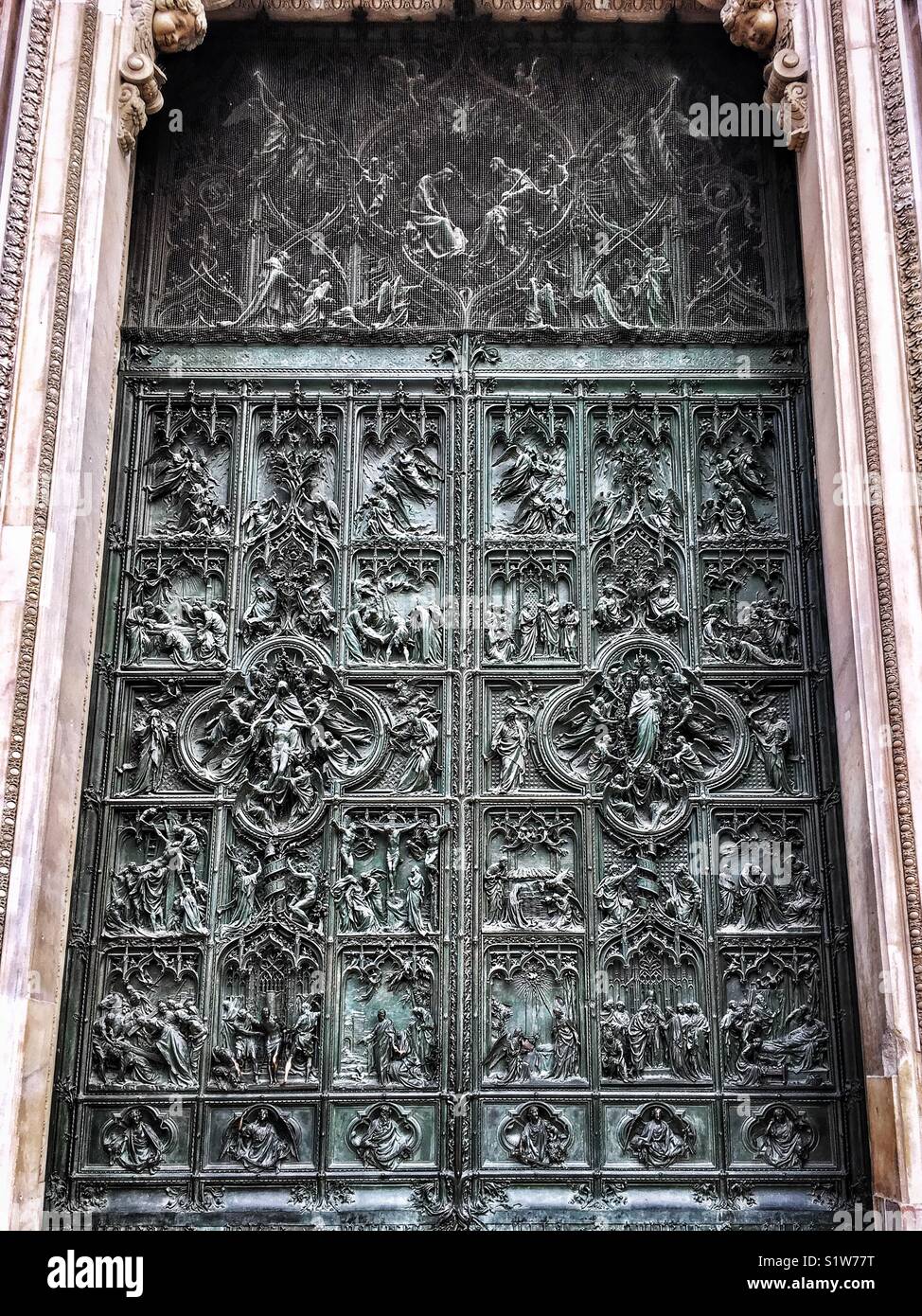 Intricate details of the cathedral door - Smartphone Captured Stock Image