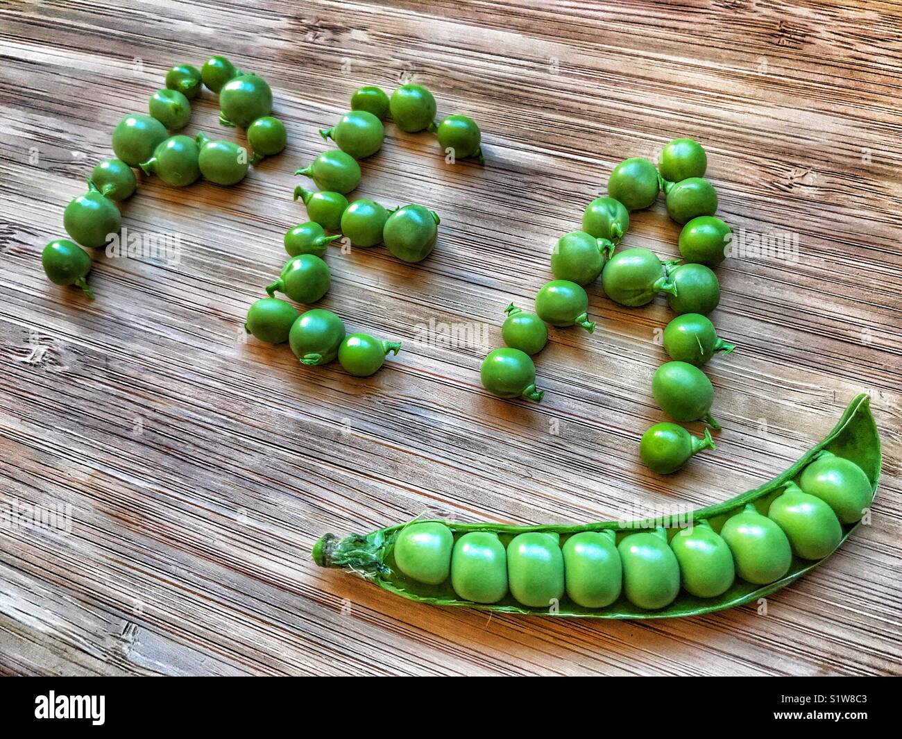 Fresh garden peas in a pod - Smartphone Captured Stock Image