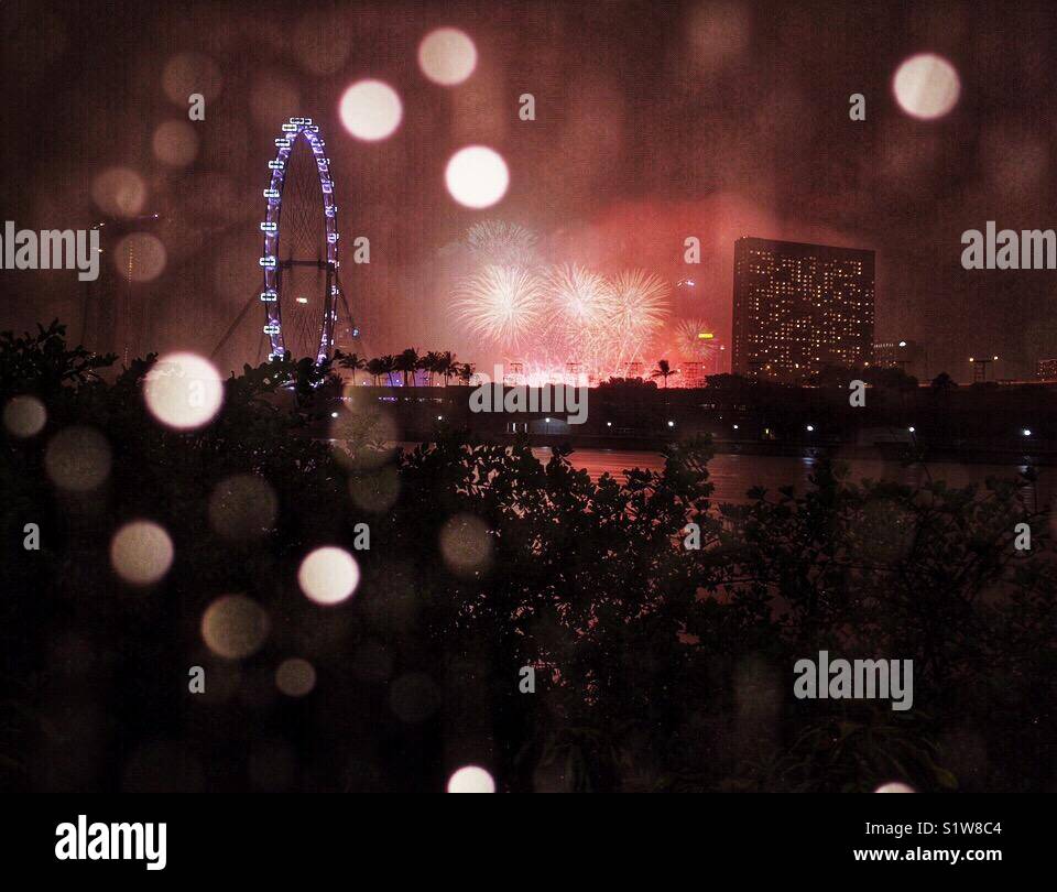 Singapore fireworks on a rainy day Stock Photo