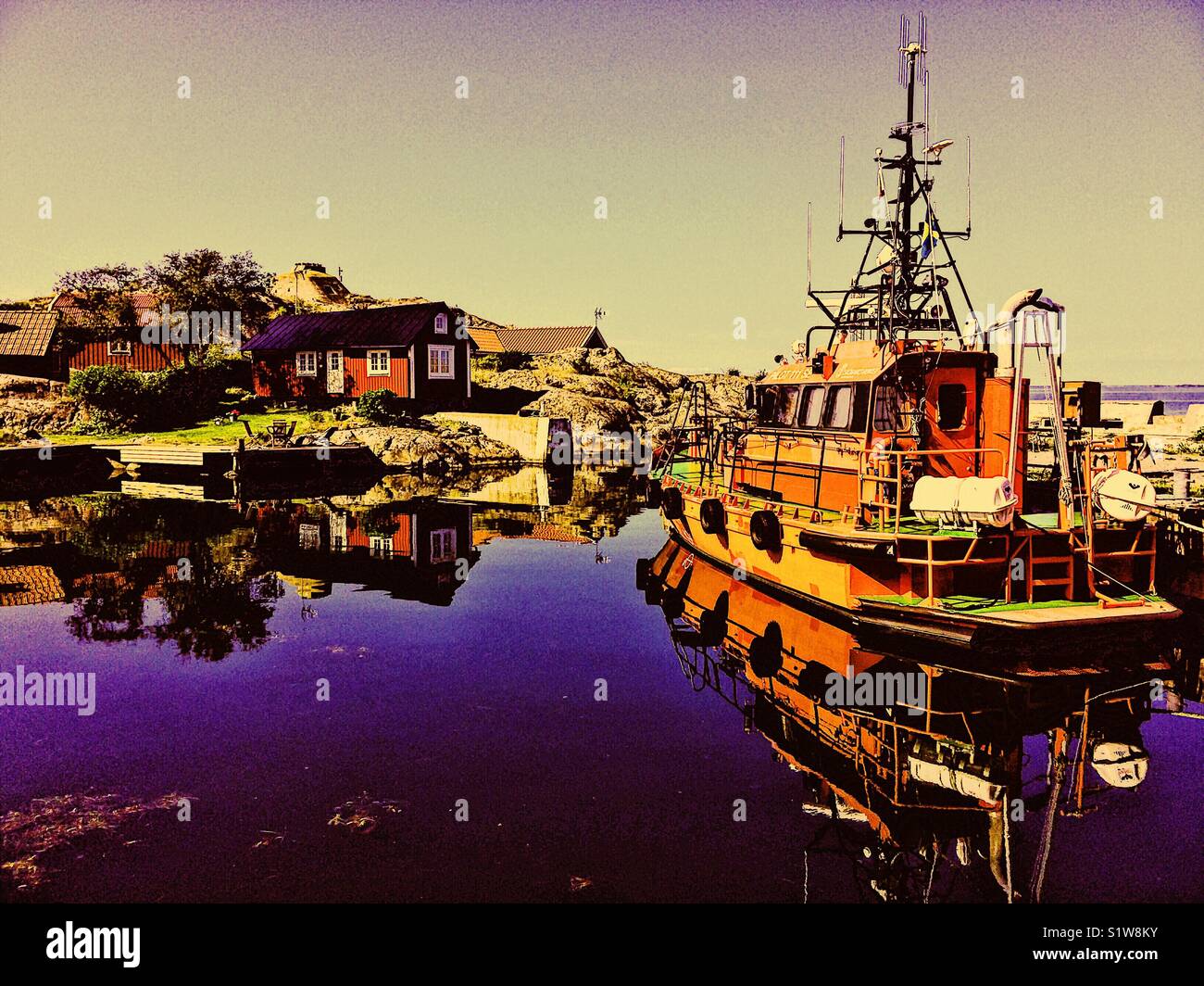Pilot boat in Vasterhamn (west harbour) on the island of Oja at the southern end of the Stockholm archipelago, Sweden, Scandinavia - Smartphone Captured Stock Image