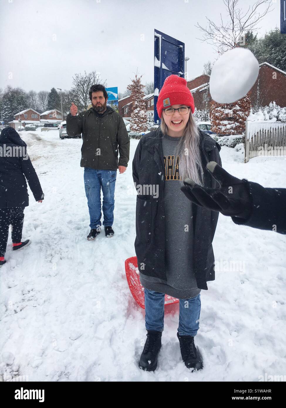 Tossing snowball - Smartphone Captured Stock Image