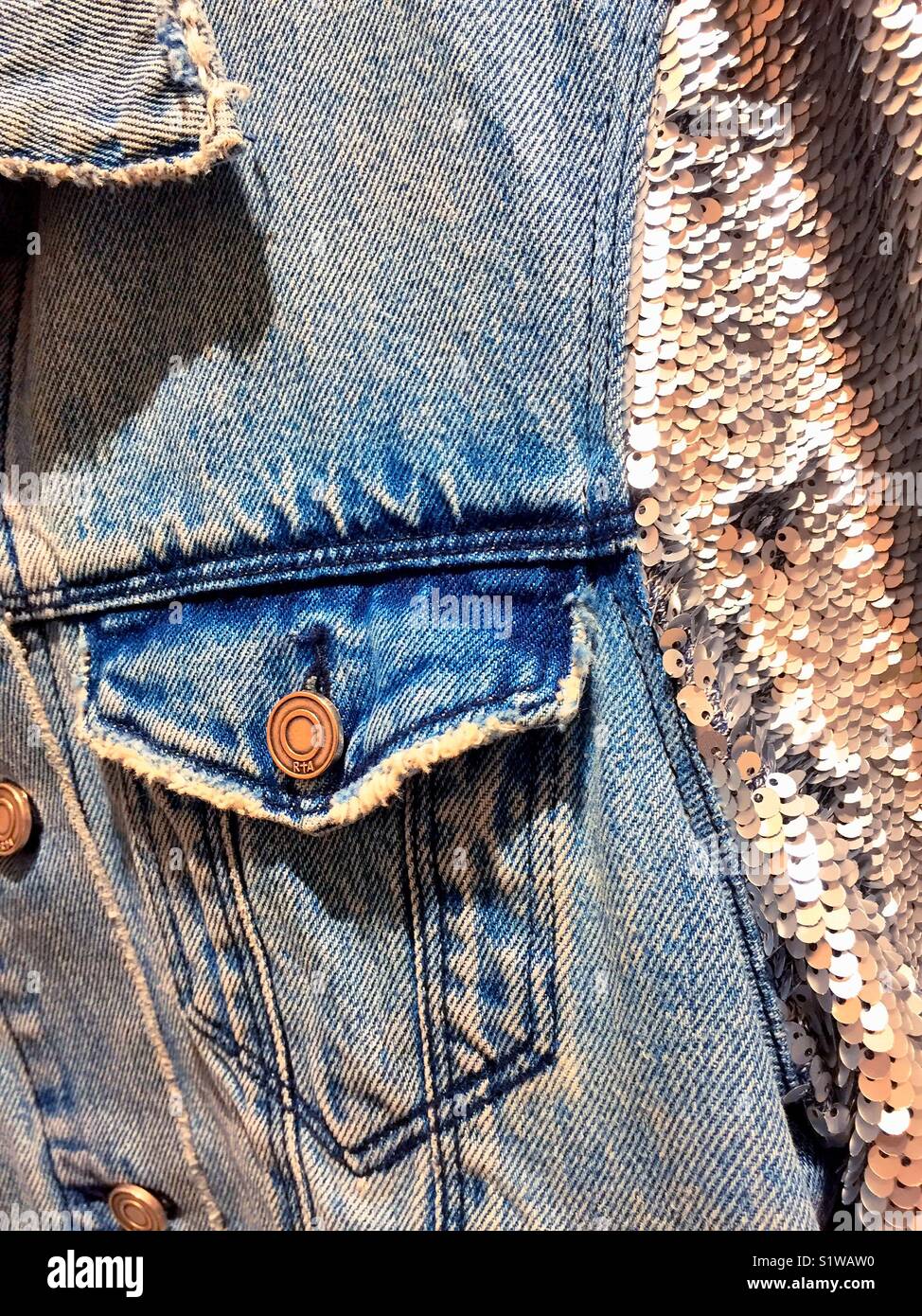 Novelty denim jacket with sequin sleeves, USAA - Smartphone Captured Stock Image
