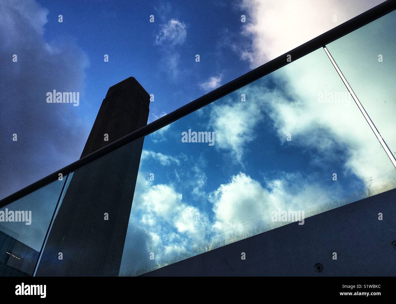 The chimney at Tate Modern by the London Millennium Footbridge in England - Smartphone Captured Stock Image