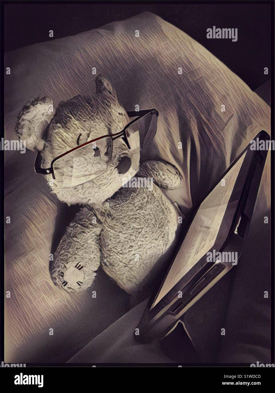 Chillin in bed with tablet in semi dark room - Smartphone Captured Stock Image