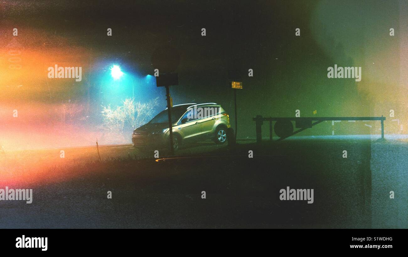 Suv car in a misty night - Smartphone Captured Stock Image