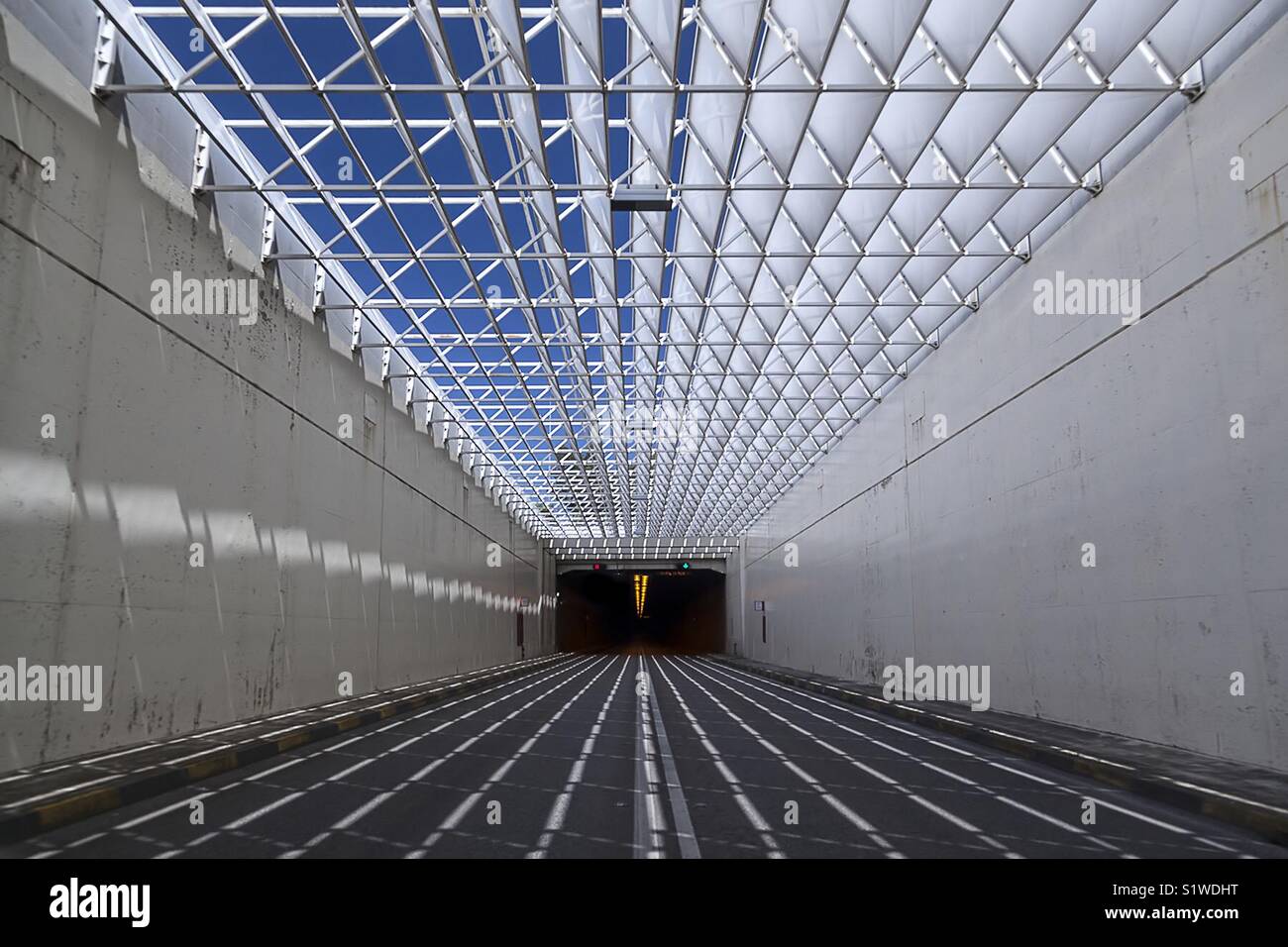 Preveza-Aktion Undersea Tunnel, Greece. A modern infrastructure marvel featuring a geometric lattice roof and minimalist architecture. - Smartphone Captured Stock Image