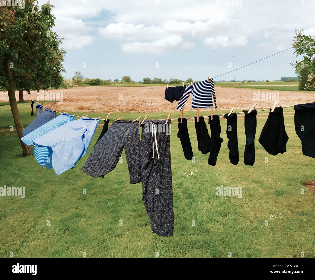 Guanock, Lincolnshire, clothes on washing-Lines, with fields beyond Stock Photo