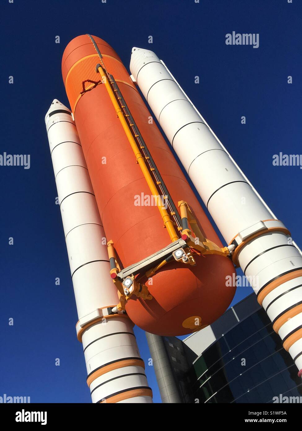 Space Shuttle solid rocket boosters and external fuel tank on display at Kennedy Space Center Visitor Complex. Stock Photo