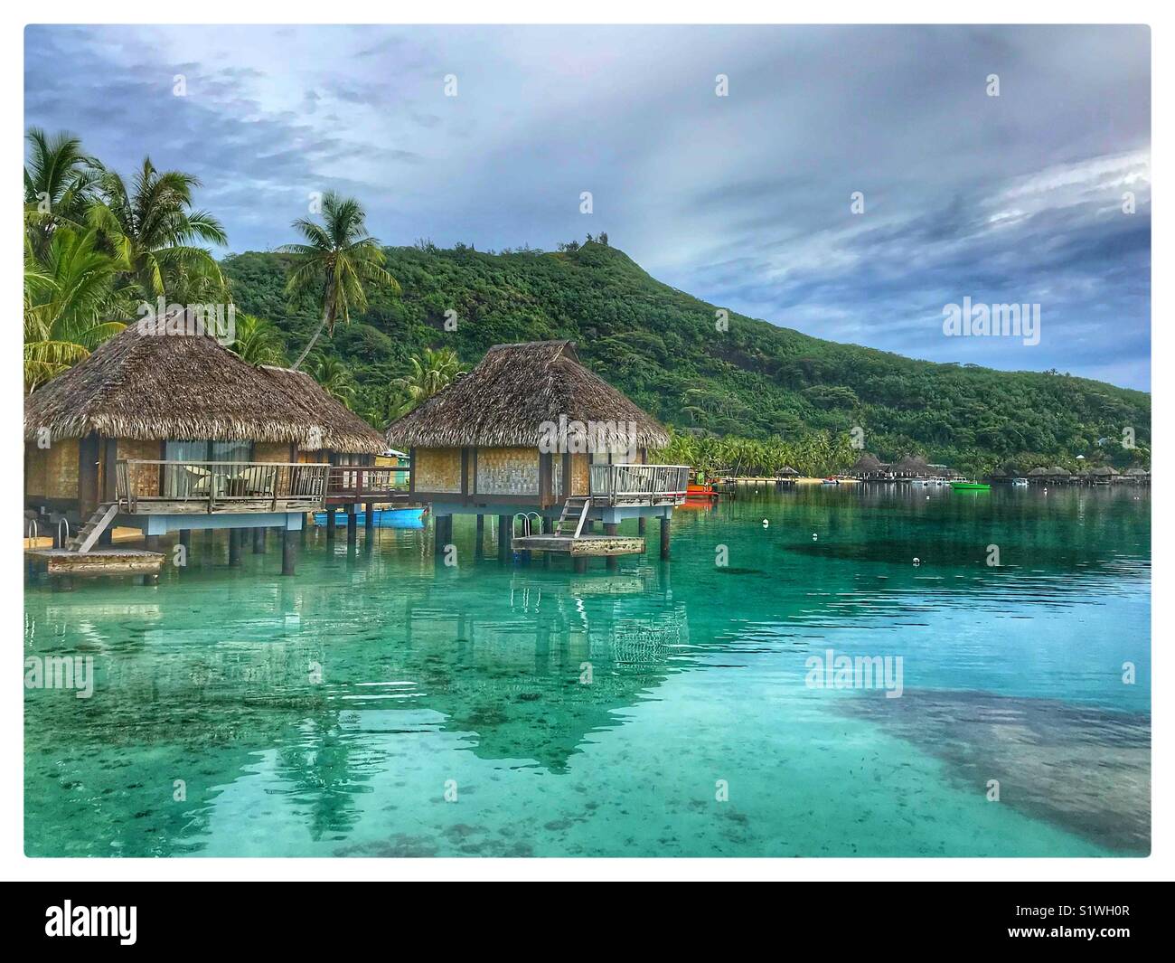 Beautiful picture of the over the water bungalows on the island of Bora-Bora in French Polynesia Stock Photo