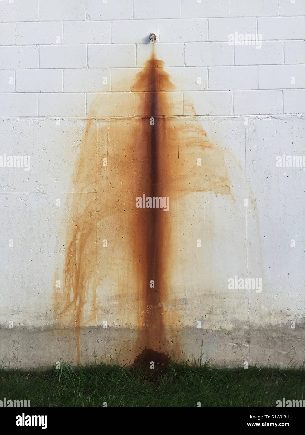 Drain spout on back of building in St. Louis Park, Minnesota, USA. - Smartphone Captured Stock Image
