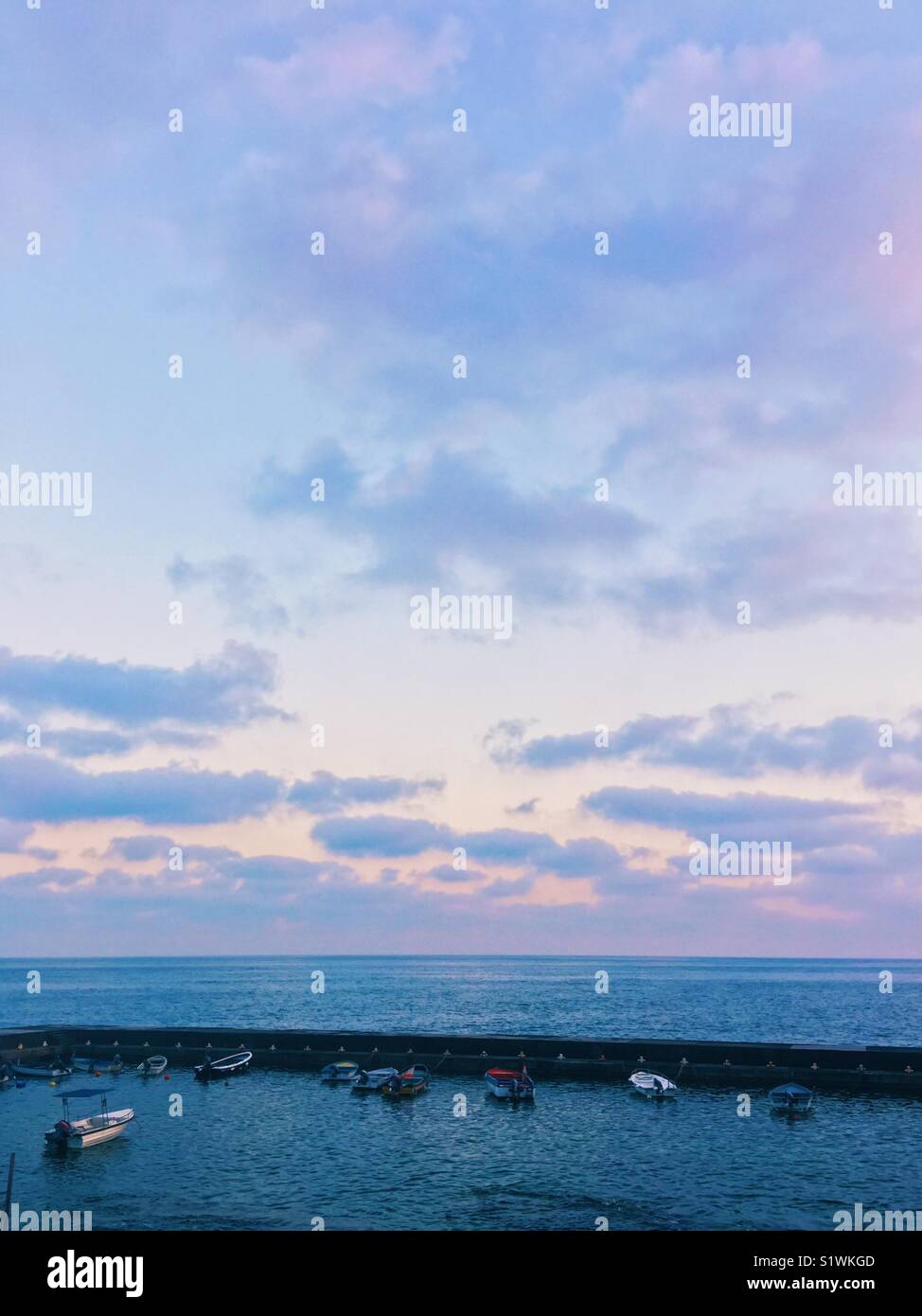 Fishing boats moored on the harbour - Smartphone Captured Stock Image