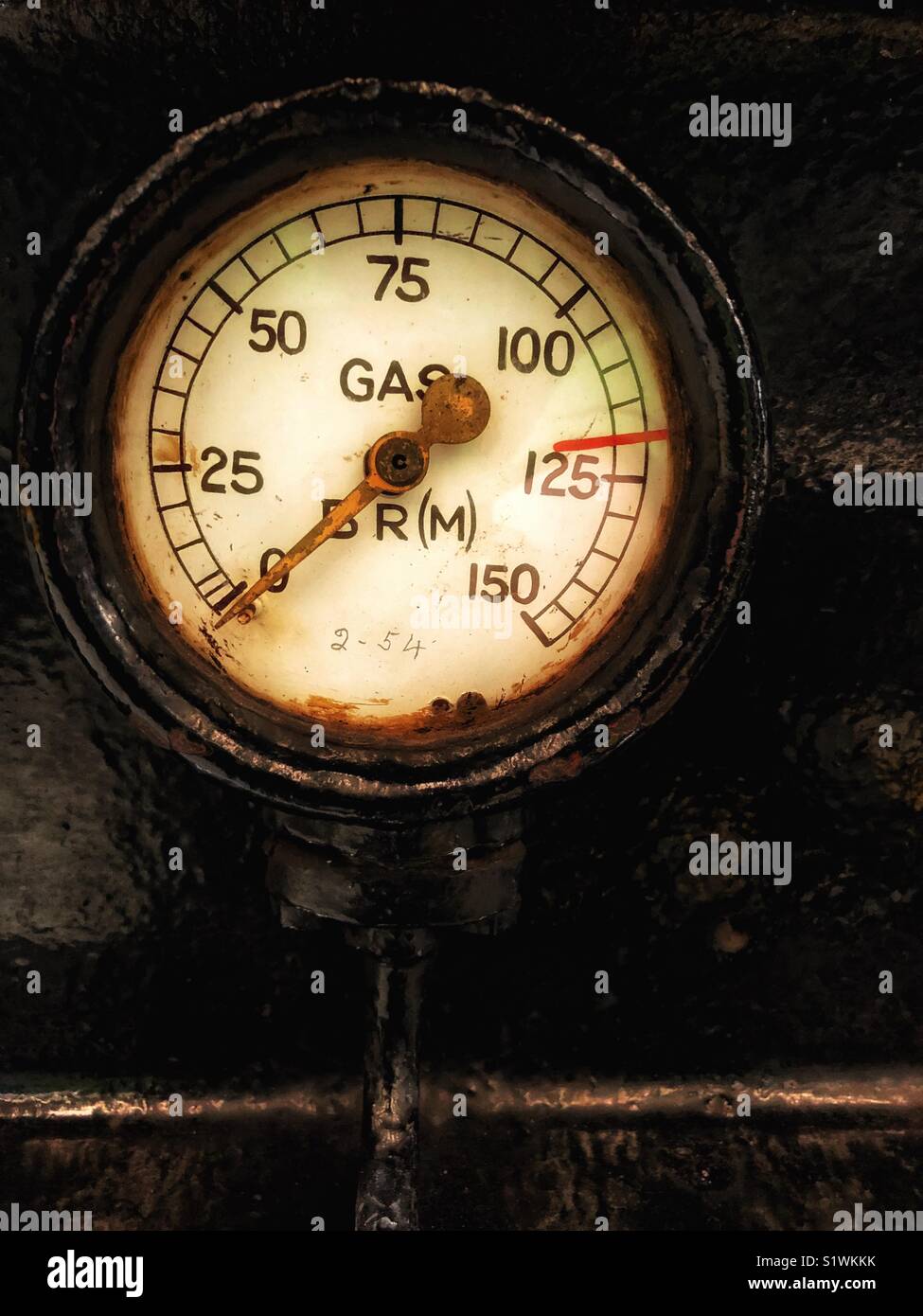 Gas gauge, an old imperial gas gauge on a train. - Smartphone Captured Stock Image