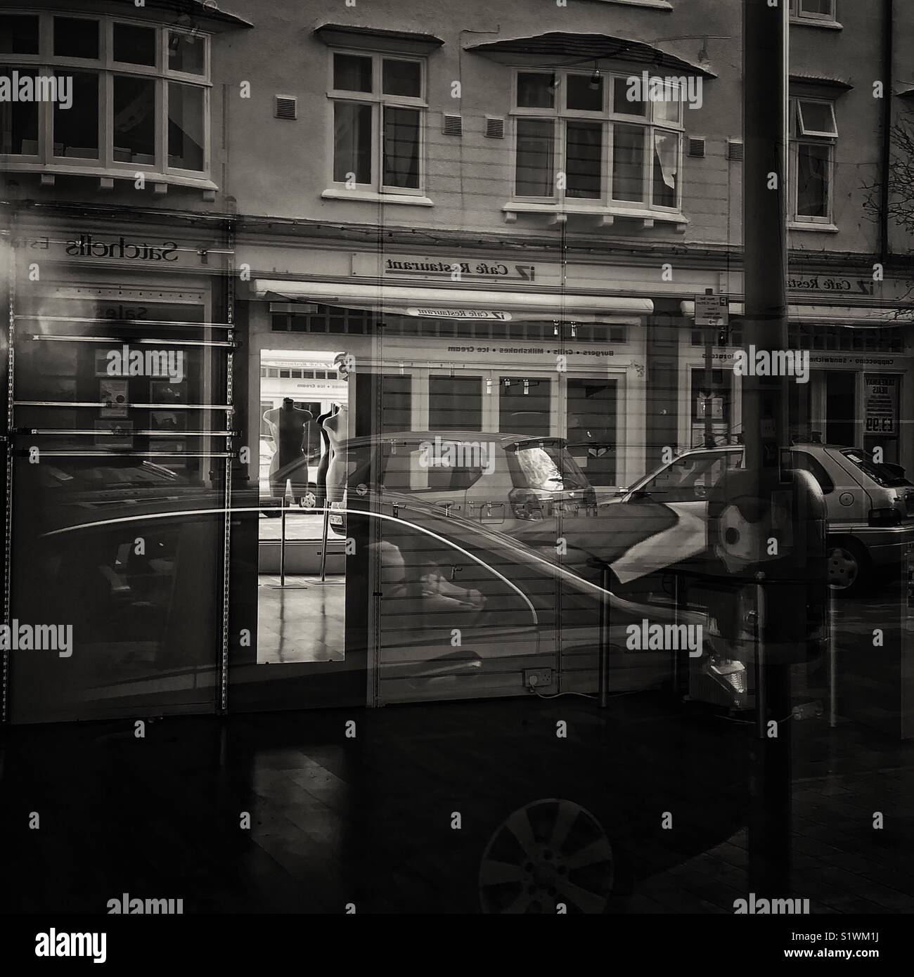 Mannequins in a mirror Stock Photo - Alamy