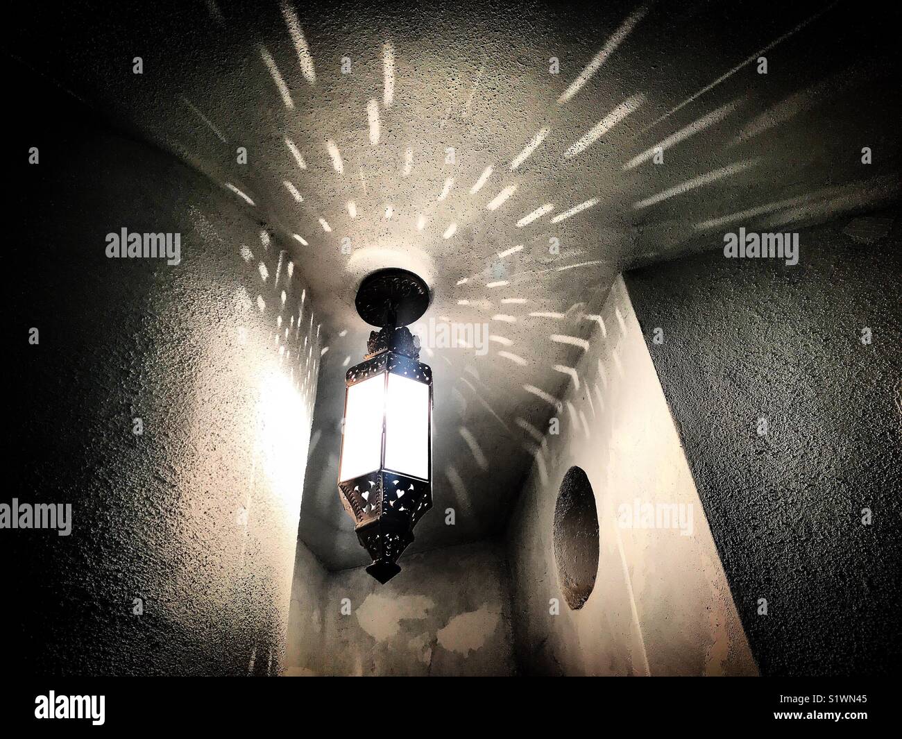 A lamp illuminates a house in Guanajuato, Mexico Stock Photo