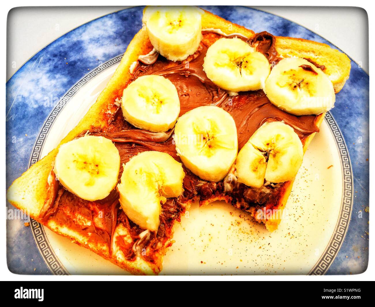 nutella-on-toast-with-sliced-banana-hi-res-stock-photography-and-images