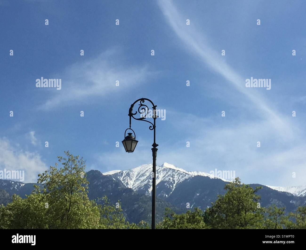 Mount Canigou with decorative street-light, Pyrénées-Orientales, France Stock Photo