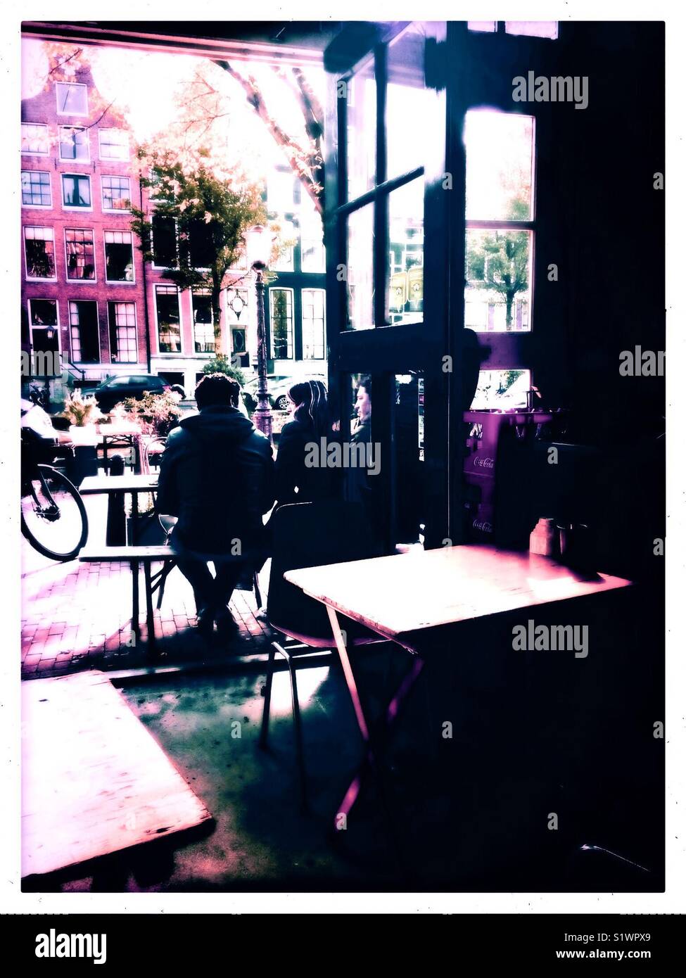 Cafe culture in the Red light district (De Wallen), Amsterdam, Netherlands - Smartphone Captured Stock Image