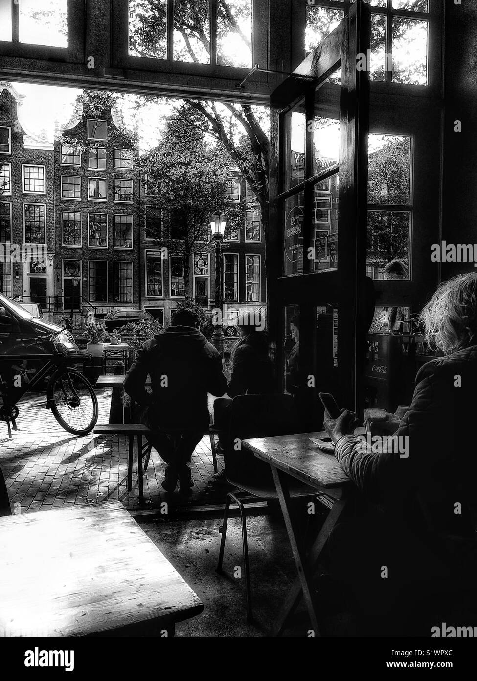 Cafe culture in the Red light district (De Wallen), Amsterdam, Netherlands - Smartphone Captured Stock Image