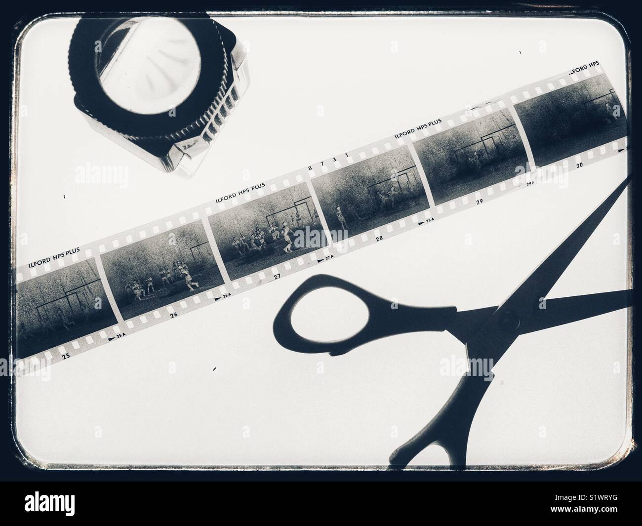 klodset Tidsplan ægtefælle Black & white negative film on Lightbox Stock Photo - Alamy