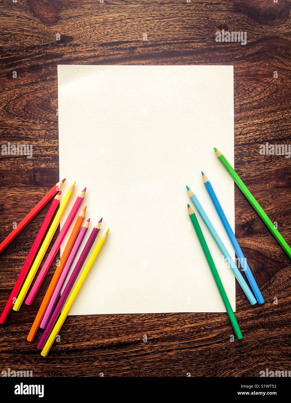 white paper with coloring crayons Stock Photo