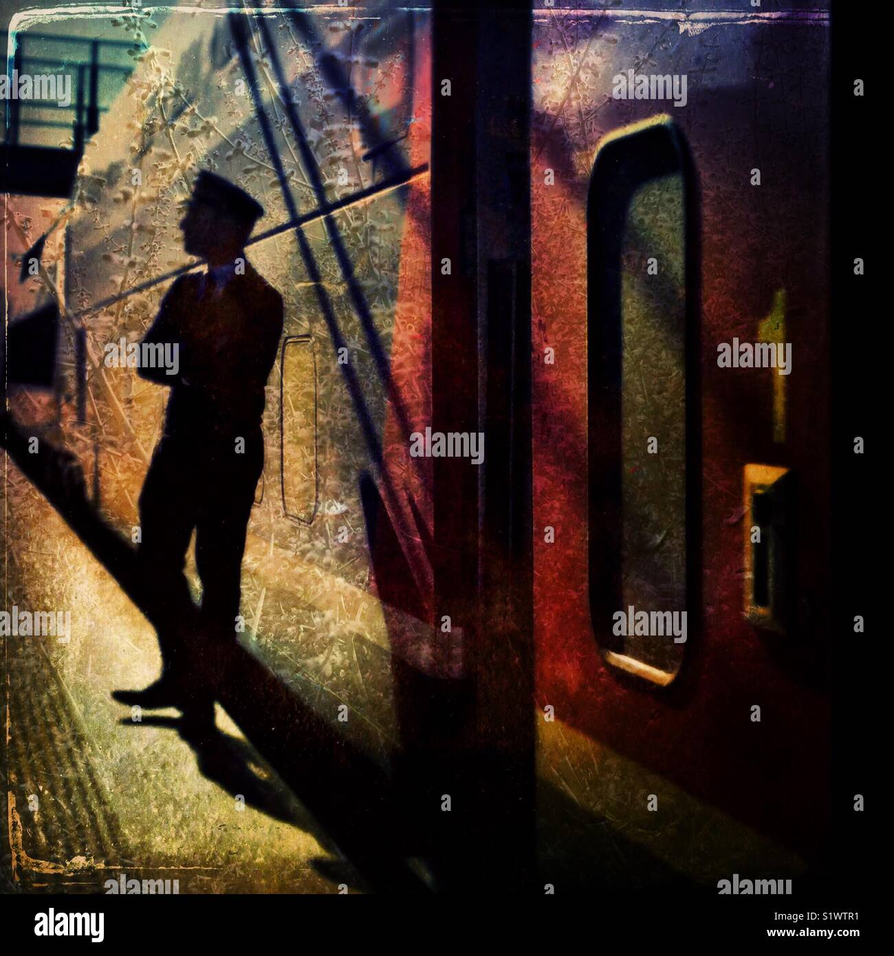 Train conductor announces the departure of a train - Smartphone Captured Stock Image