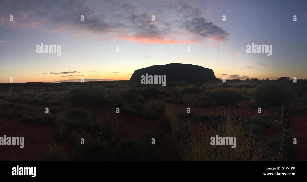 Uluru at sunrise Stock Photo