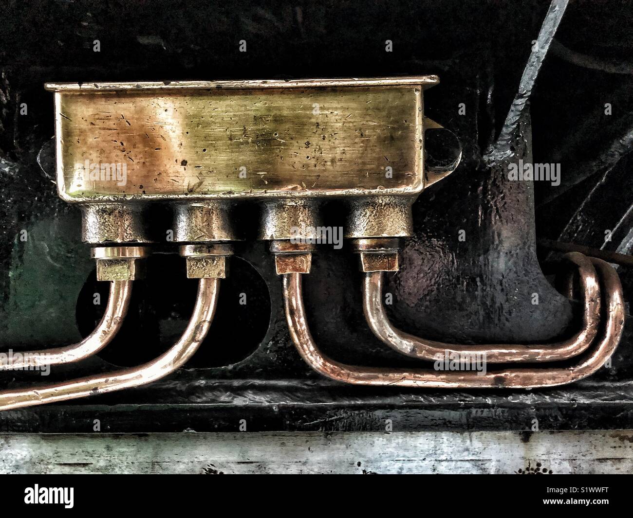 Steam train, brass Fluid Reservoir - Smartphone Captured Stock Image