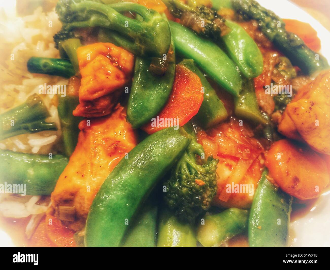 Stir fry turkey and vegetables with rice Stock Photo Alamy