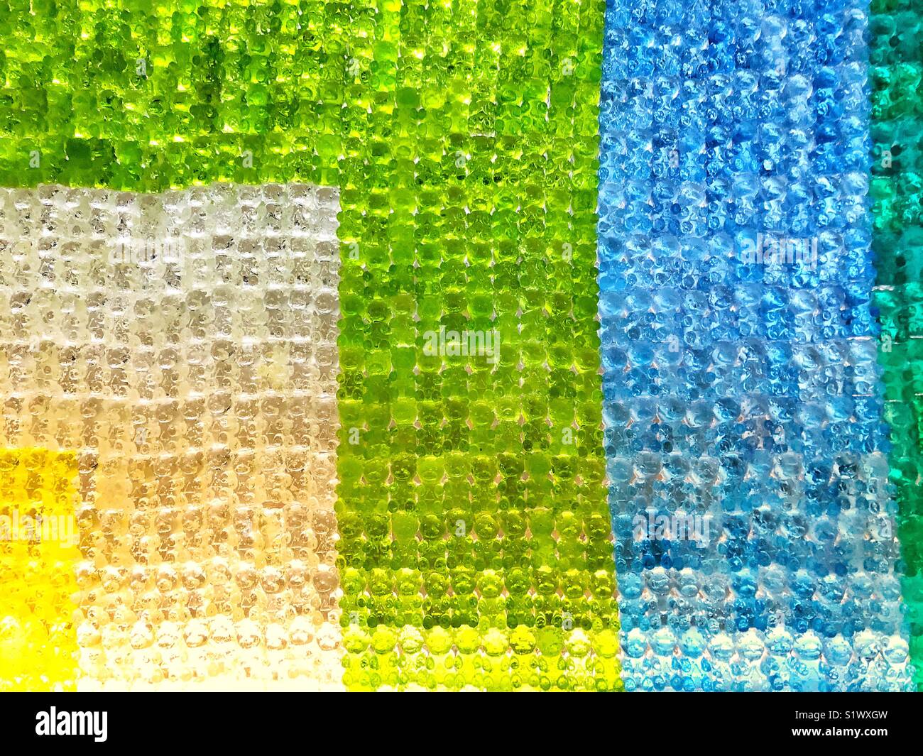 Geometric pattern created from gummy bears. Stock Photo