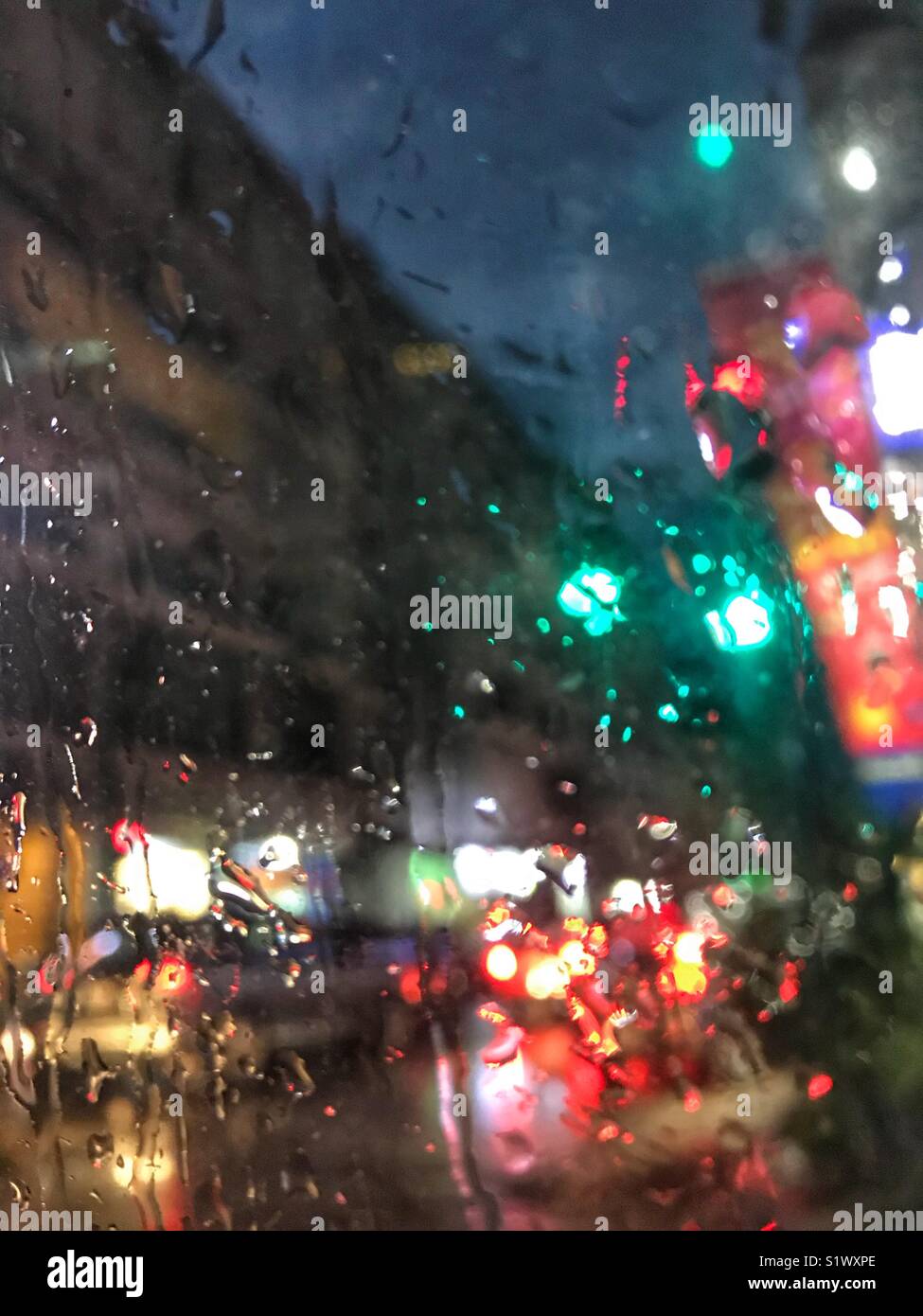 City lights in a rainy night - Smartphone Captured Stock Image