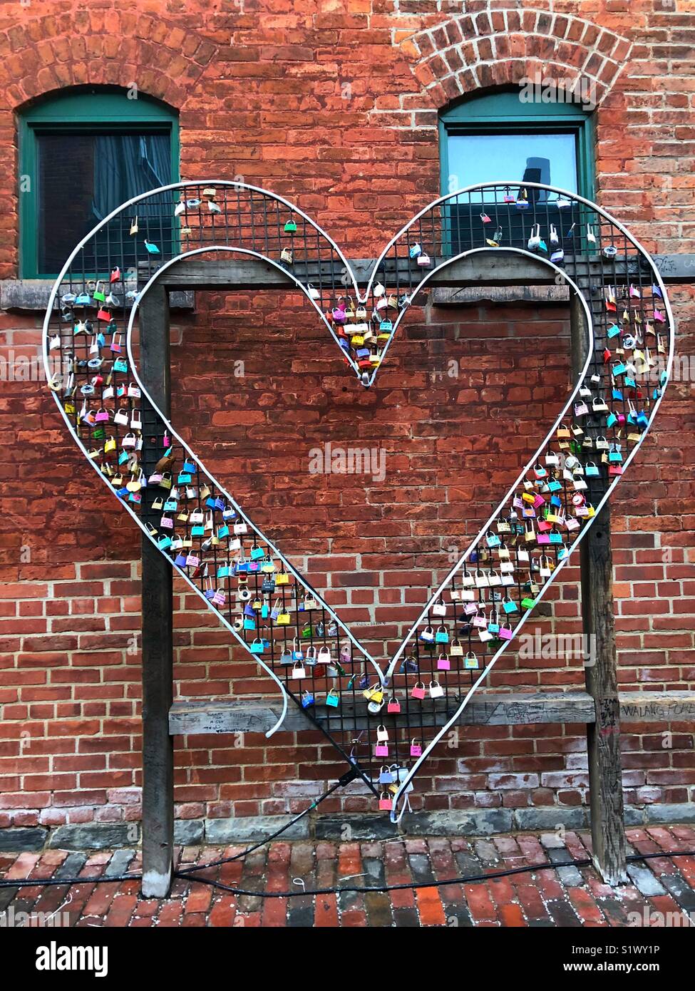 Love locks on a large heart sculpture in Toronto’s historic Distillery