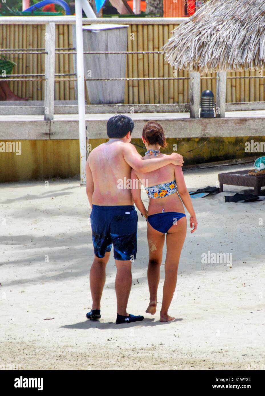 Couple photo posing for a selfie on the beach in Bora-Bora, French Polynesia, South Pacific - Smartphone Captured Stock Image