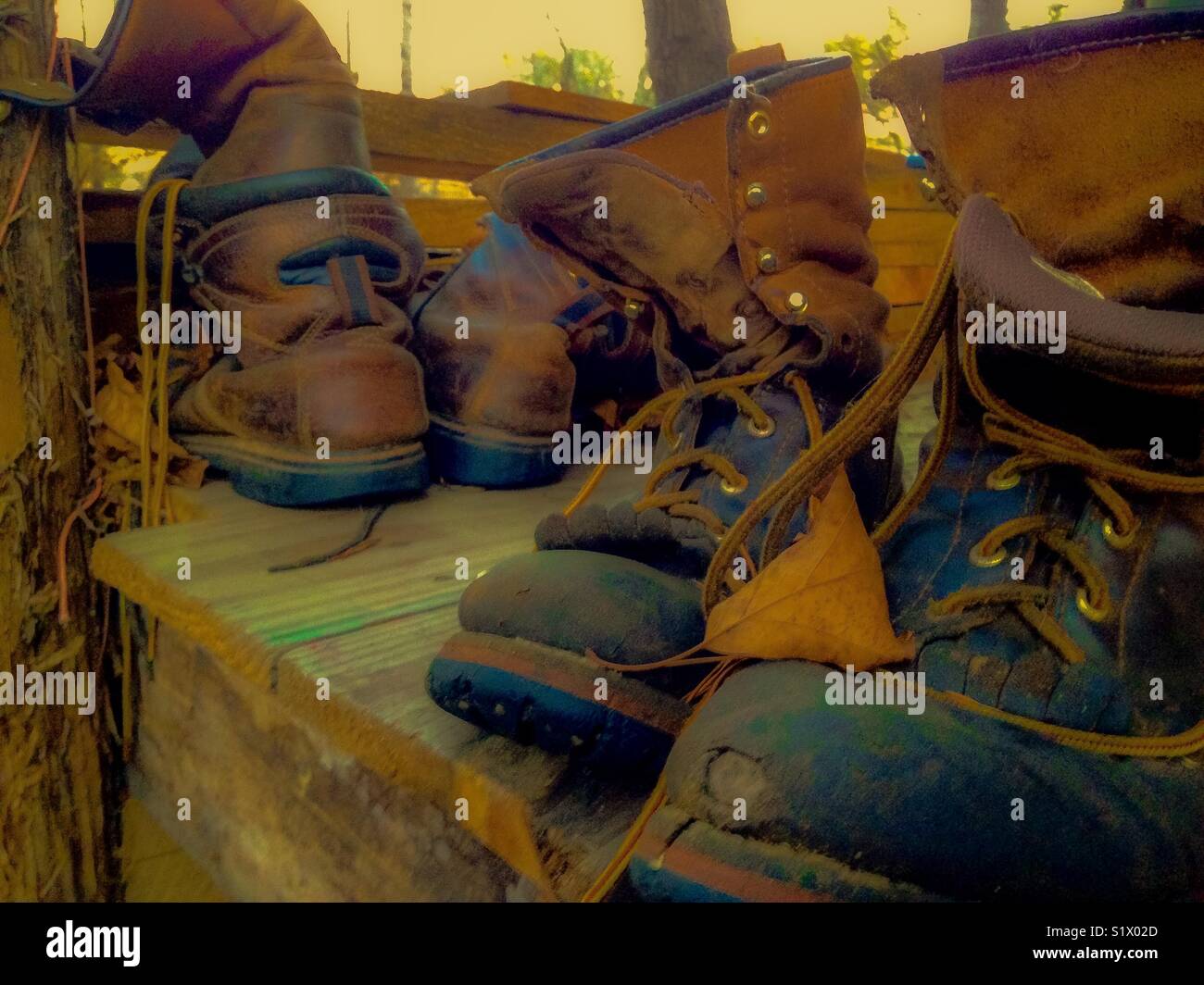 Discarded work boots for flower pots - Smartphone Captured Stock Image