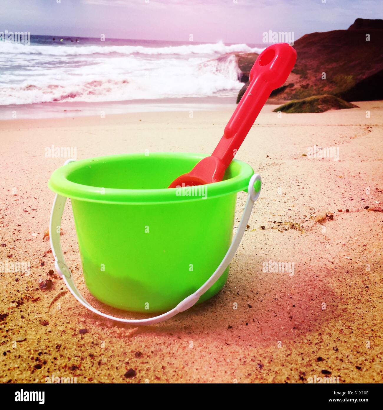 Bucket and spade at the beach Stock Photo Alamy