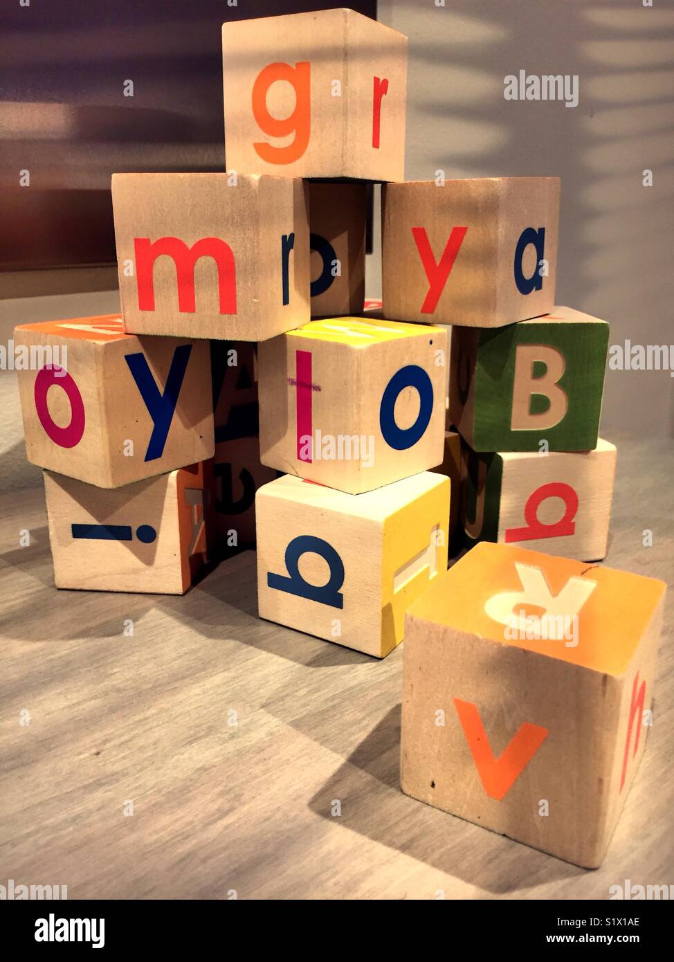 Stack of children’s letter blocks, United States - Smartphone Captured Stock Image