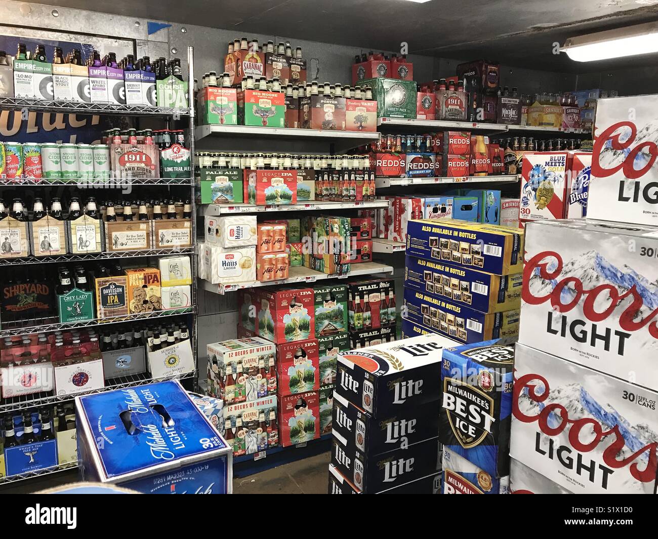 Walk in beer cooler in a grocery store Stock Photo